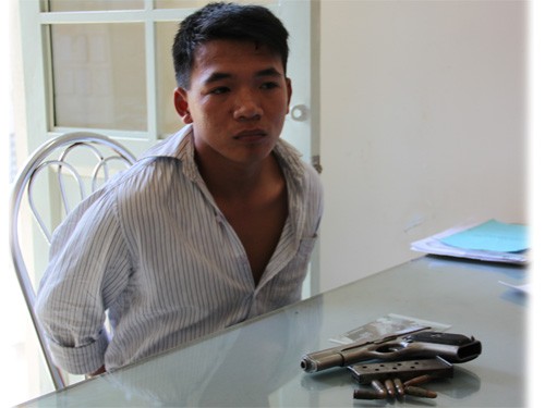 Hưng “ruồi” - đàn em của Cương "Cầu Xéo" bị bắt cùng khẩu súng K54 - Ảnh: Kim Cương