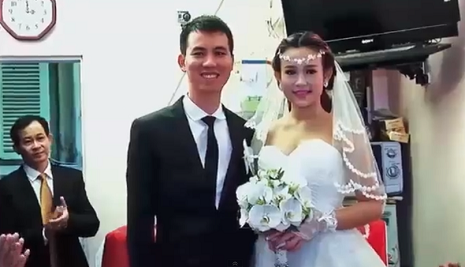 Cô dâu Ngọc Huyền và chú rể Quang Huy trong ngày cưới.