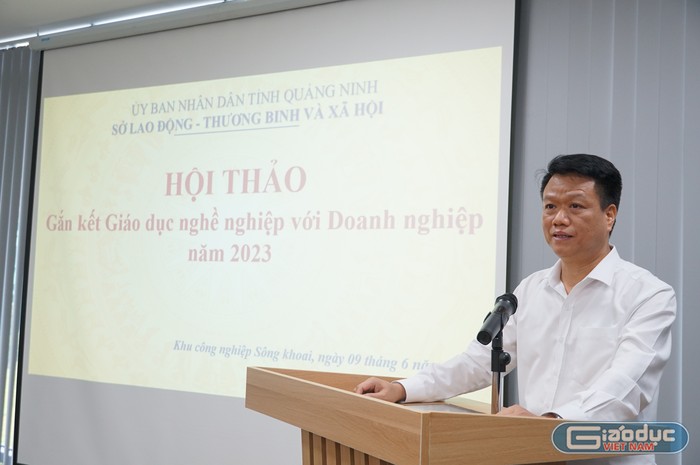 Ông Vũ Quang Trực - Phó Giám đốc Sở Lao động - Thương binh và Xã hội phát biểu khai mạc hội thảo (Ảnh: Phạm Linh)