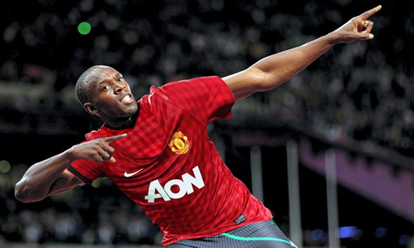 Usain Bolt, người chạy nhanh nhất thế giới hâm mộ M.U từ rất lâu.