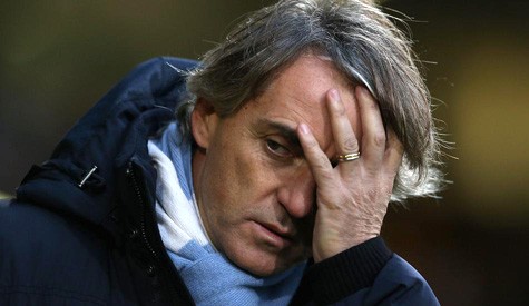 Mancini rời Man City trong tủi hổ.