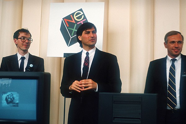 Steve Jobs rời Apple vào năm 1985 sau một cuộc tranh giành quyền lực với CEO John Sculley và thành lập công ty riêng mang tên NeXT. Hoạt động phát triển phần cứng không mấy thuận lợi nhưng phần mềm phát triển rất tốt, Apple mua NeXT vào năm 1997 và mời Jobs làm tư vấn.