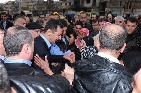 Tổng thống Assad đã có chuyến thăm bất ngời tới huyện Baba Amr.