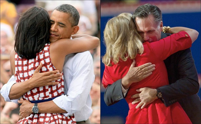 Tổng thống Mỹ ôm đệ nhất phu nhân Michelle Obama. Còn Romney ôm lấy vợ Ann.