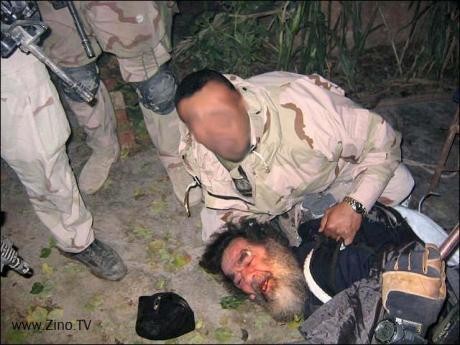 Ảnh Saddam Hussein khi bị lực lượng liên quân bắt sống tại Iraq