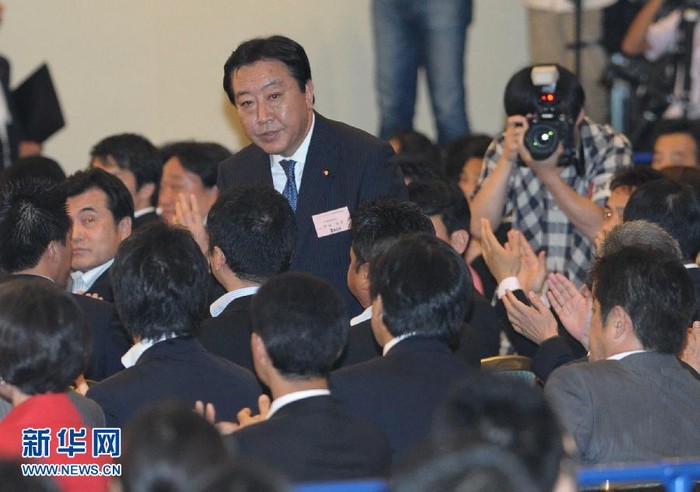 Tân thủ tướng Nhật ăn mừng chiến thắng sau khi công bố kết quả bầu cử sáng 30/8.