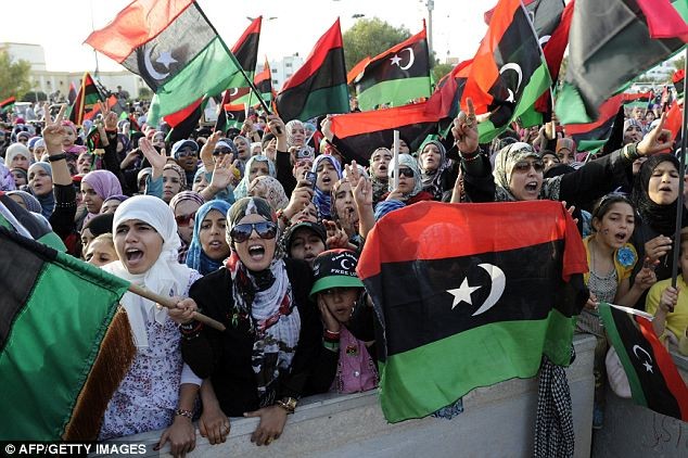 Người dân Libya ăn mừng sau cái chết của Đại tá Gaddafi và tuyên bố đất nước Libya hoàn toàn được giải phóng bởi lực lượng cách mạng