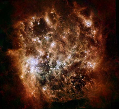 Vùng màu vàng hiển thị khu vực nóng nhất trong thiên hà lùn hay còn được biết đến bằng tên gọi Large Magellanic Cloud.