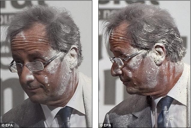 Người ông Francois Hollande phủ đầy bột trắng sau khi bị tấn công