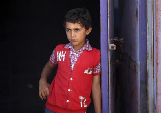 Một đứa trẻ Syria đứng tại trại tị nạn Altinozu ở Altinozu, tỉnh Hatay, Thổ Nhĩ Kỳ ngày 10/6/2011