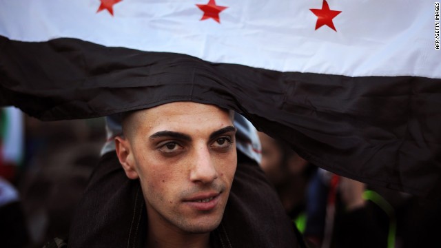 Người biểu tình phản đối chính phủ tại Syria. Ảnh CNN