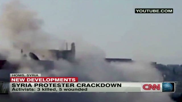 Khói lửa trong một cuộc xung đột giữa quân chính phủ và lực lượng nổi dậy Syria tại thành phố Homs