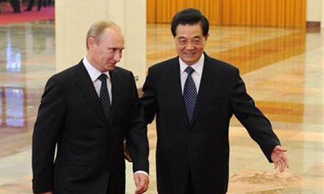Tổng thống Putin (trái) và Chủ tịch Trung Quốc Hồ Cẩm Đào