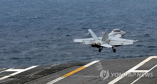 F/A-18 Super Hornet cất cánh từ tàu sân bay USS George Washington khi tham gia tập trận chung với quân đội Hàn Quốc trên biển Hoàng Hải ngày 24/6.