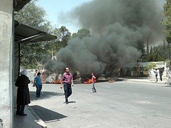 Chiến sự trên đường phố Kabun, phía đông thủ đô Damascus, Syria.