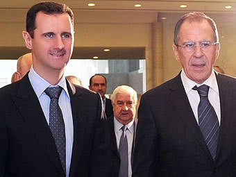Tổng thống Syria Bashad al-Assad (trái) và Ngoại trưởng Nga Sergei Lavrov.