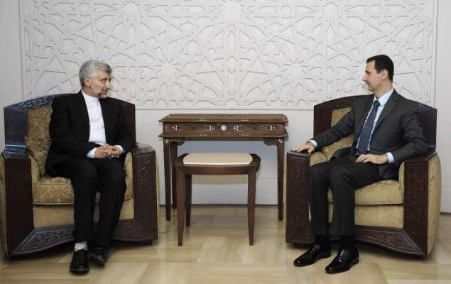 Cảnh ông Jalili và hội đàm với Tổng thống Assad tại Damascus hôm 7/8 được truyền hình nhà nước Syria phát sóng.