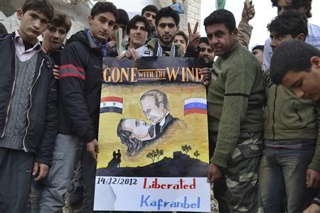 Người biểu tình phản đối sự lãnh đạo của Tổng thống Syria Bashar al-Assad tại Kafranbel hôm 14/12.