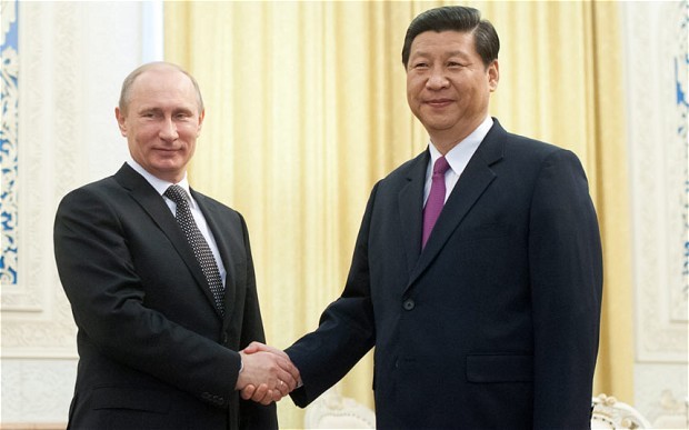 Tổng thống Nga Vladimir Putin (trái) và Tổng bí thư đảng Cộng sản Trung Quốc Tập Cận Bình.