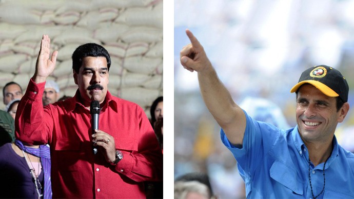 Phó Tổng thống Nicolas Maduro (bên trái) và ứng cử viên Henrique Capriles Radonski – lãnh đạo phe đối lập.