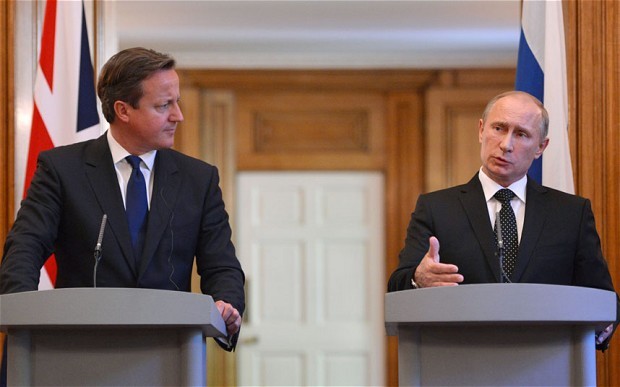Thủ tướng Anh David Cameroon và Tổng thống Nga Vladimir Putin phát biểu trước thềm hội nghị G8 2013.
