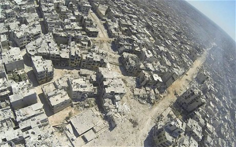 Một góc thành Homs hoang tàn đổ nát sau trận chiến ác liệt hôm 29/7.