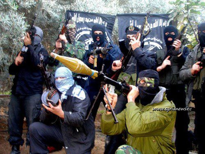 Các chiến binh thuộc Mặt trận al-Nursa liên kết với al-Qaeda chiến đấu chống lại quân đội Syria tại Syria.