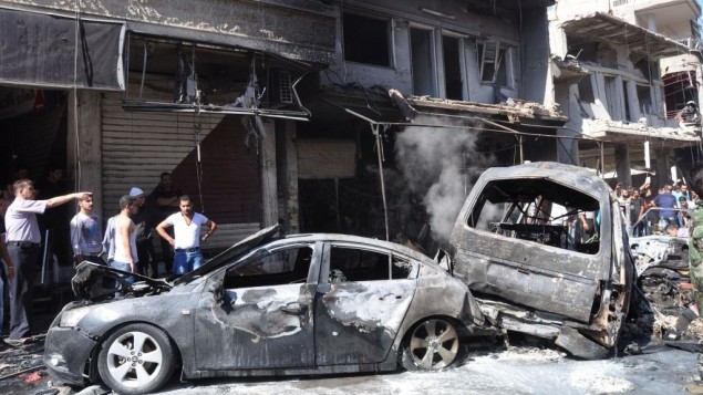 Hiện trường một vụ đánh bom ở thủ đô Damascus hôm 25/7.