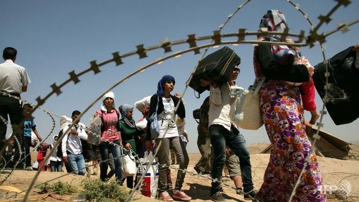 Người Kurd chạy trốn bạo lực và cái đói.