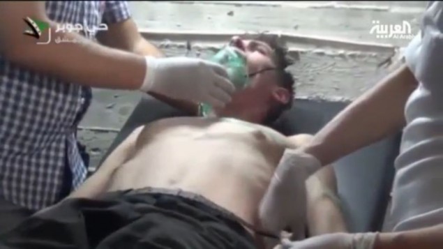 Một nạn nhân của vụ tấn công vũ khí hóa học tại Syria.
