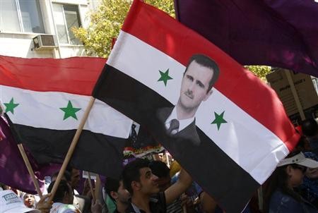 Người dân Syria biểu tình ủng hộ Tổng thống Assad tại thủ đô Damascus.