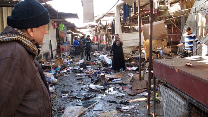 Hiện trường vụ đánh bom kép ở một khu chợ ngày Giáng sinh tại Baghdad.