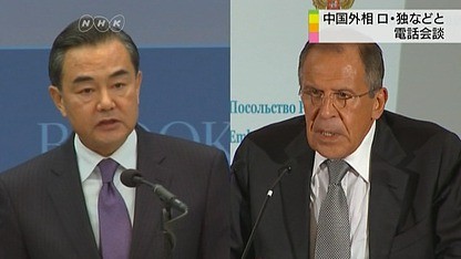 Ngoại trưởng Trung Quốc Vương Nghị (trái) và Ngoại trưởng Nga Sergei Lavrov.