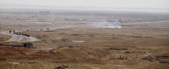 Đoàn xe của dân quân người Kurd di chuyển tới địa điểm chiến đấu với các tay súng ISIS ở ngoại ô Diyala ngày 14/6/2014.