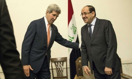 Ngoại trưởng Mỹ John Kerry (trái) và Thủ tướng Nuri al-Maliki.