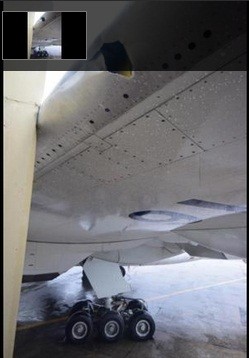 Một phần máy bay bị thiệt hại trong sự cố.
