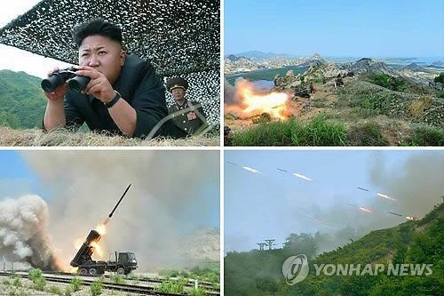 Nhà lãnh đạo Triều Tiên Kim Jong-un quan sát các cuộc tập trận tên lửa, pháo binh ở khu vực ven biển.