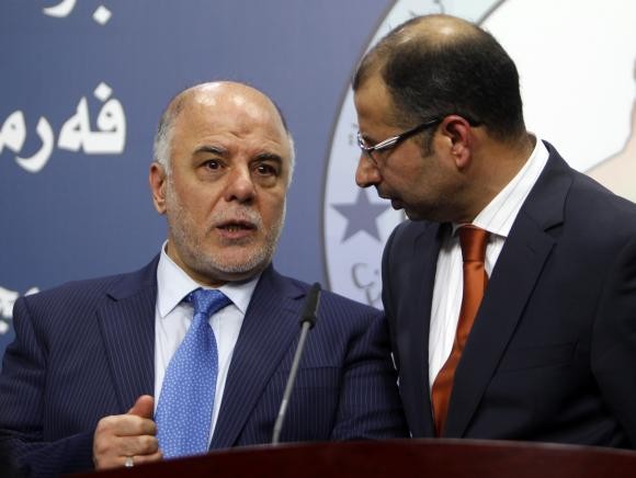 Tân Thủ tướng Iraq Maliki Haider al-Abadi (trái).