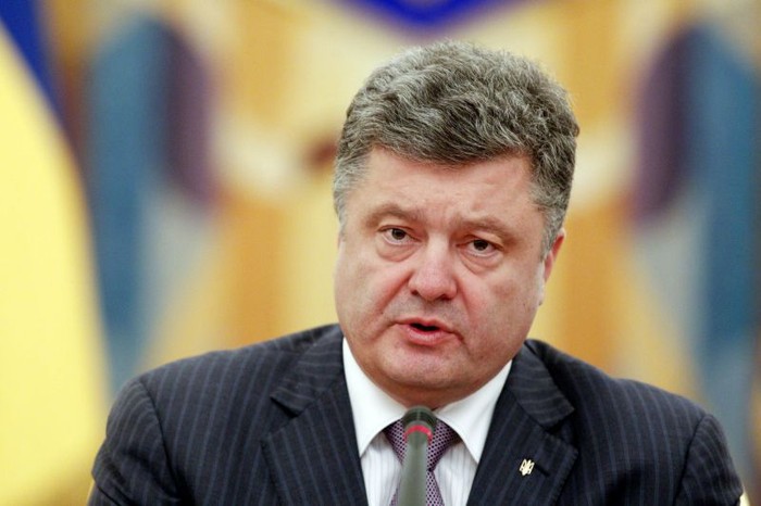 Báo Nga bình luận, ông Poroshenko thực sự đang muốn thoát khỏi gánh nặng Donbass.