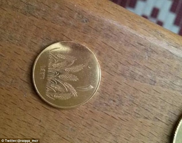 Đồng tiền xu có hình lúa mì của IS.