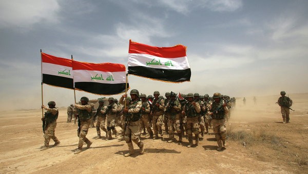 Binh sĩ Iraq tập luyện dưới sự hướng dẫn của sĩ quan Tây Ban Nha và Mỹ gần Baghdad. Ảnh Rian.
