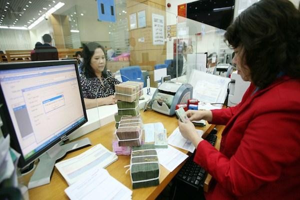 Cục thuế Hà Nội cho biết, sẽ bị phong tỏa tài khoản của doanh nghiệp chây ỳ, nợ thuế trong khi vẫn có dòng tiền luân chuyển. Ảnh minh họa.