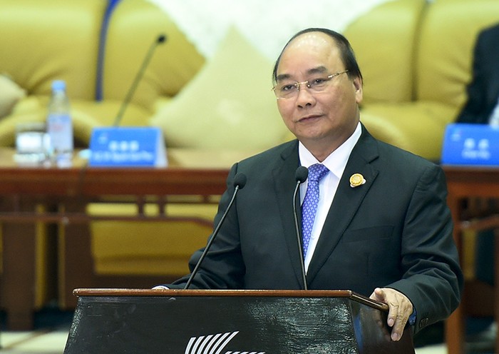 Thủ tướng Nguyễn Xuân Phúc đối thoại với lãnh đạo các DN hàng đầu Trung Quốc. Ảnh: VGP/Quang Hiếu.