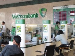 Vietcombank hạ lãi suất xuống 6%, mức thấp chưa từng có trong thời gian này. Ảnh Vietnamplus.