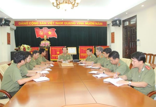Đại tướng Trần Đại Quang trong một cuộc họp chỉ đạo ban chuyên án truy bắt đối tượng Giang Kim Đạt.